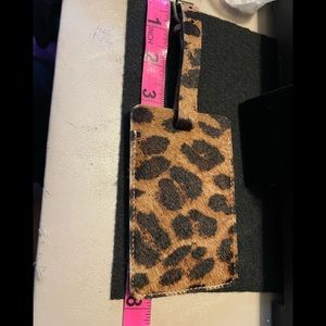 Patricia Nash furry cheetah print luggage tag